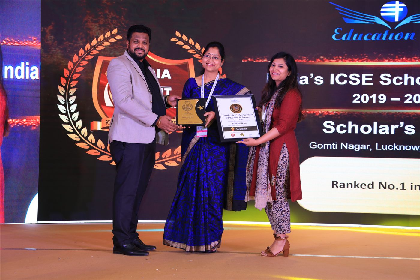 Scholars' Home faculty receiving recognition at an awards ceremony